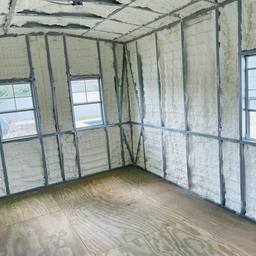 Closed-cell spray foam insulation applied to wall cavities in a residential project in Hillsborough
